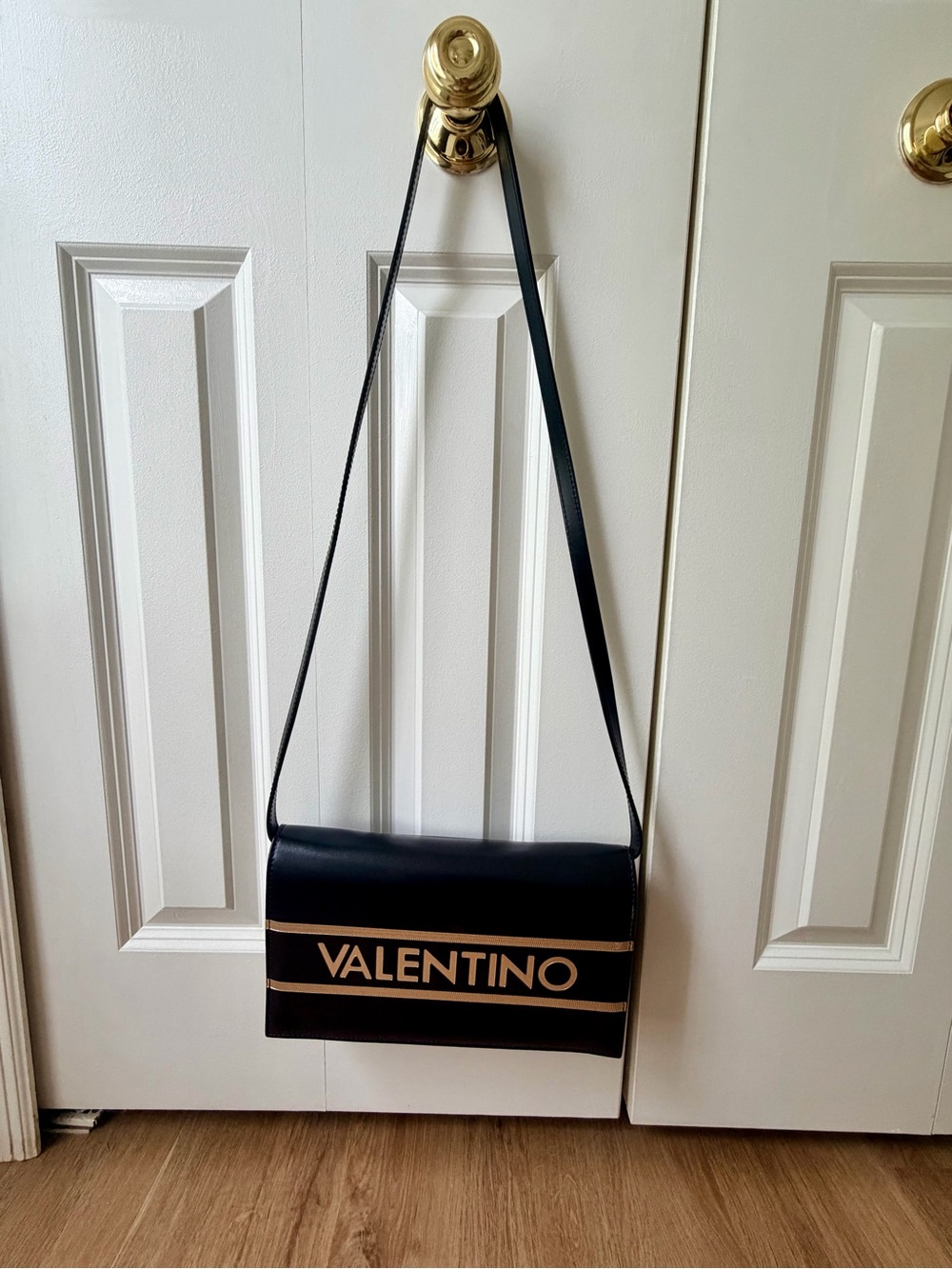 Valentino Black Shoulder Bag with Gold Logo Stripe and Removable Strap